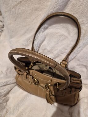 Coach Tan Leather Shoulder Bag with Tassel and Gold Hardware